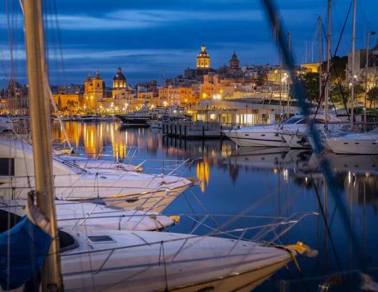 Malta skyline representing the evolving job market and hybrid work salary trends